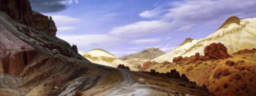A winding dirt road curves through a rocky, semi-arid landscape with tan hills and red boulders under a dramatic sky filled with large, dark clouds and patches of bright blue.