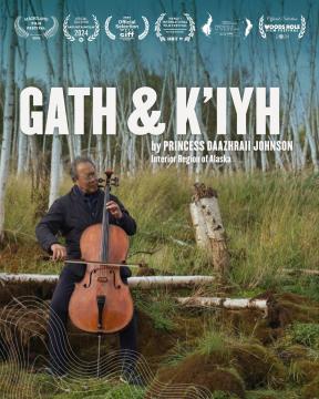 An elderly man plays a cello in a grassy field with tall trees. The image features film festival laurels and the title "GATH & K'IYH" by Princess Daazhraii Johnson. The setting suggests a natural, serene environment in Alaska.