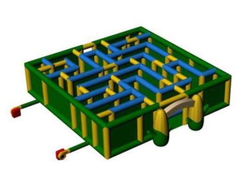 3D illustration of a rectangular inflatable maze with green, blue, and yellow walls, featuring an entrance decorated with two large corn cob shapes and two red blower tubes attached at the sides.