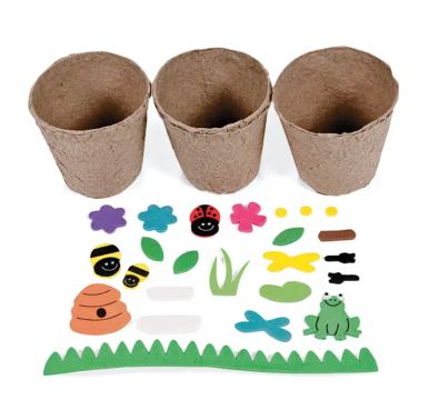 Three brown plant pots are placed above colorful foam cutouts, including bees, a ladybug, flowers, a frog, grass, a beehive, insects, and leaves, arranged neatly on a white background.