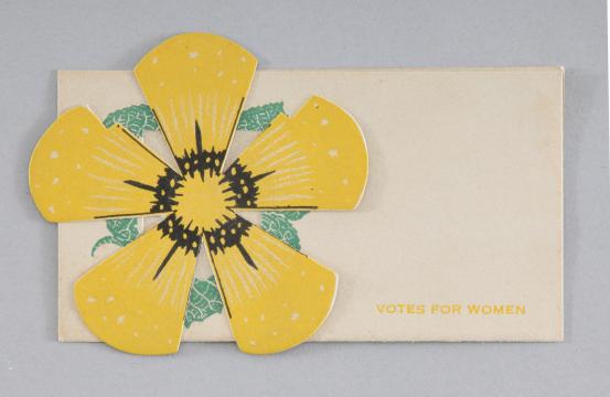 place card with large yellow flower