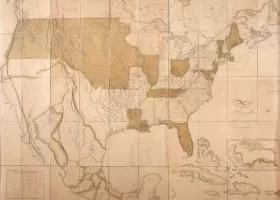 sepia-toned map of the US, with creases where it had been folded into squares