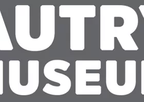 white text saying "Autry Museum" against grey background