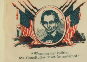envelope stamped with portrait of Abraham Lincoln with text saying "Whatever our Politics, the Constitution must be sustained."