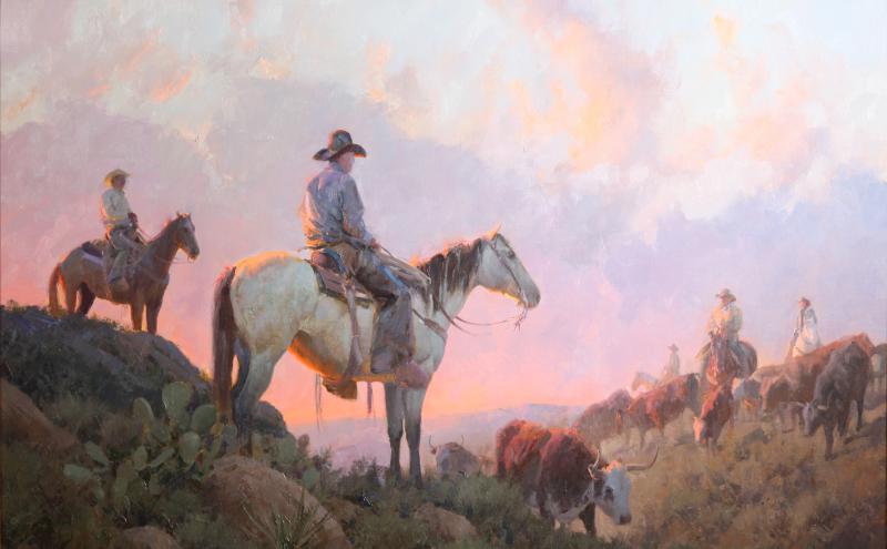 A painting depicts cowboys on horseback herding cattle across a hilly landscape. The scene is bathed in soft pastel colors from the early morning or late afternoon sky, with clouds glowing pink and orange. Cacti and shrubs dot the terrain.