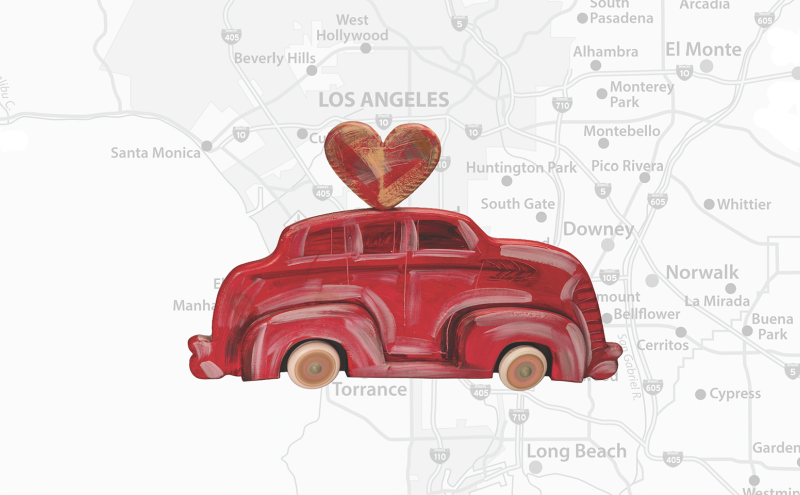 A painted red vintage car with a heart on its roof is centered over a faded map of Los Angeles and its surrounding areas.