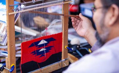 a man weaves