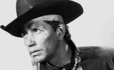 close up of American Indian wearing a cowboy hat