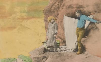 illustrated image of a man and a woman looking over the Grand Canyon