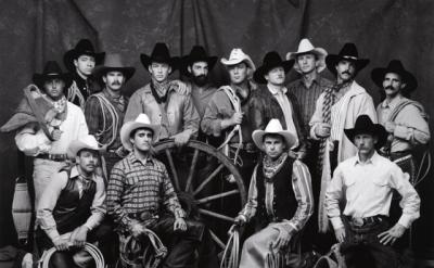 Black and white image of cowboys