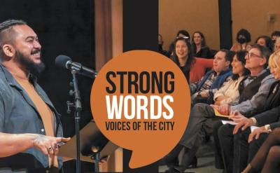 Two people speak into microphones on stage, one smiling. A diverse audience sits on the right, engaged and smiling. The event is titled "Strong Words: Voices of the City" in an orange speech bubble.