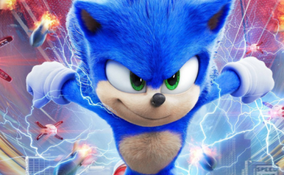 A cartoon-style blue hedgehog with green eyes is running energetically. Lightning bolts and red robotic drones surround him in a dynamic backdrop. The scene conveys speed and excitement.