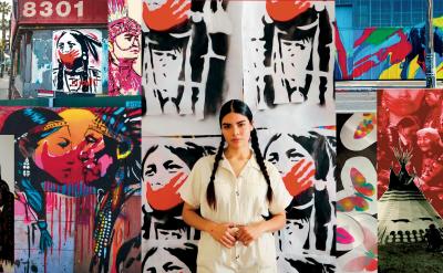 A woman with long dark hair in braids stands in front of bold, colorful murals featuring Native American imagery, stylized portraits, bison, teepees, and geometric patterns.