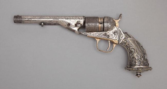 a pocket navy conversion revolver that is engraved