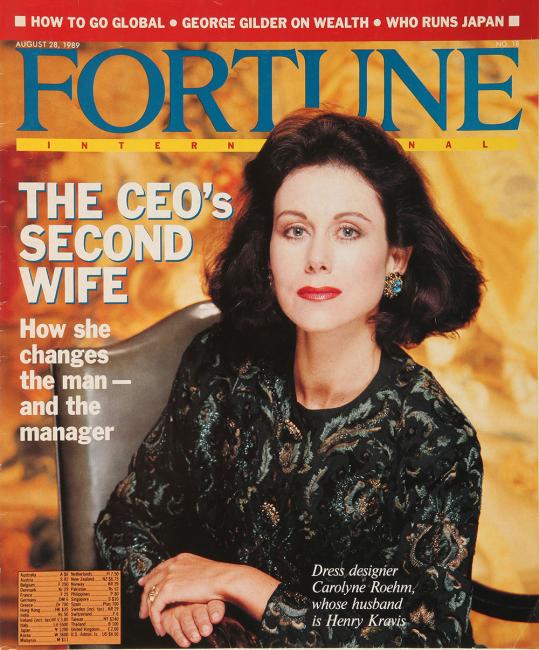 magazine cover with portrait of well dressed woman sitting in a chair