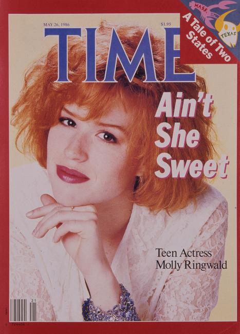 magazine cover with woman leaning her chin on her hand