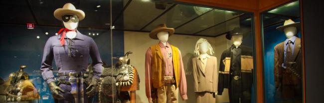 mannequins with western-style clothing on display