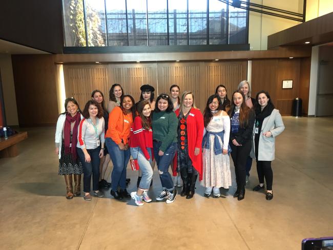 group of students posing for the camera in large group