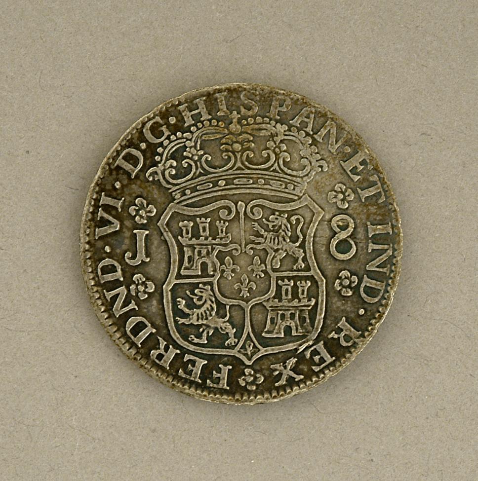 An old silver coin with a crowned shield featuring castle and lion symbols, the number 8, and inscriptions in Latin around the edge on a plain background.