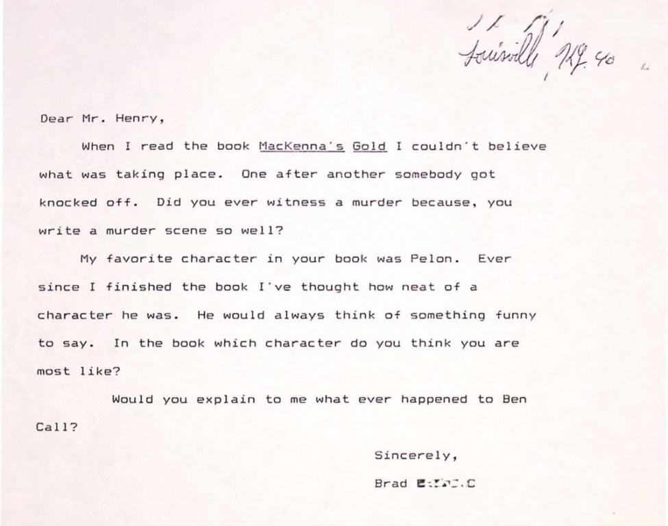 A typed letter to Mr. Henry praising the book "MacKenna’s Gold," asking about writing murder scenes, the character Pelon, and the fate of Ben Call. The letter is signed by Brad E. and dated 2/24/96 handwritten in the top corner.