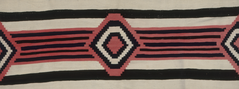 beige textile with stripes and a diamond pattern in black and red