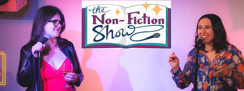 Two people stand with microphones on a stage. One wears a black jacket and red top, holding a drink. The other wears a patterned blouse. Behind them is a sign that reads "The Non-Fiction Show." A "Autry Museum After Hours" logo is visible on the left.