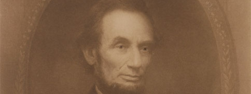 Sepia-toned portrait of Abraham Lincoln, shown from the chest up, facing slightly to the side, wearing a dark suit, white shirt, and bow tie, with a somber expression inside an ornate oval frame.